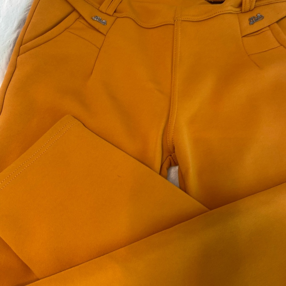 ****Brand new *thick leggings. Says one size but they are small. Mustard color